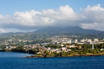 Naklejka na ściany i meble Martinique Resorts Beneath Foggy Mountain
