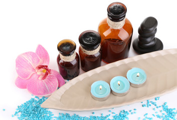 Beautiful spa setting with flower isolated on white