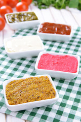 Various sauces on table close-up