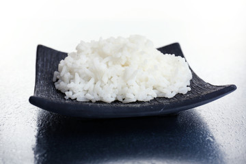 Cooked rice on grey background