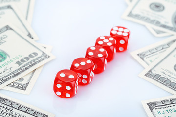 Red dices and money, isolated on white