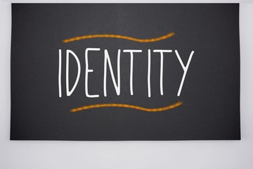 Identity written on big blackboard