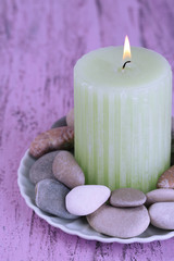 Composition with spa stones, candle
