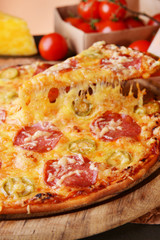 Tasty pizza on table close-up