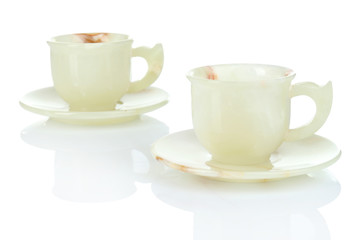 Onyx or marble stone empty cups, isolated on white