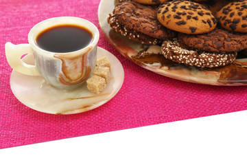 Cup of coffee with cookies, close up