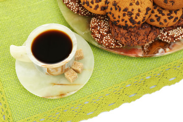 Cup of coffee with cookies, close up