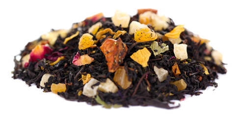 Heap of dry black tea isolated on white