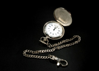 Old pocket watch with chain