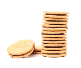 Stack of filled cookies.