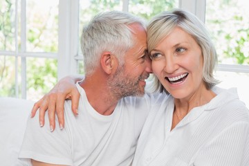 Loving mature couple with arm around