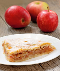 Apple pie on wooden table