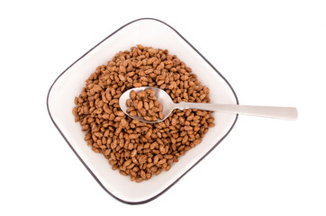 Delicious and healthy cereal in bowl isolated on white