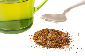 glass cup with fresh green tea leaves