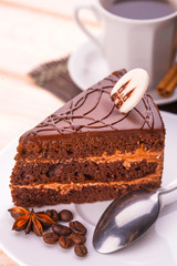 delicious chocolate cake and cup of coffee