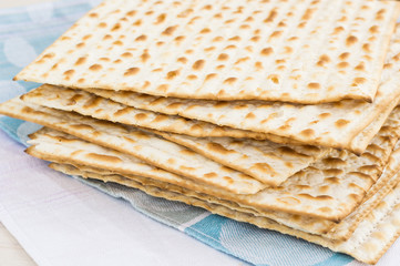 Matzot for passover celebration on a wooden table