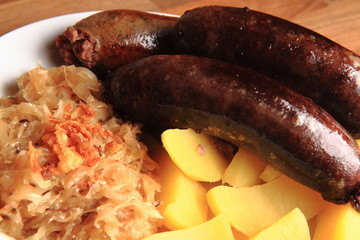 czech food - black and white pudding with potatoes and sauerkrau