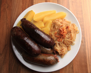 czech food - black and white pudding with potatoes and sauerkrau