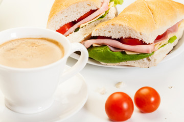 Panini sandwich with ham, cheese and tomato