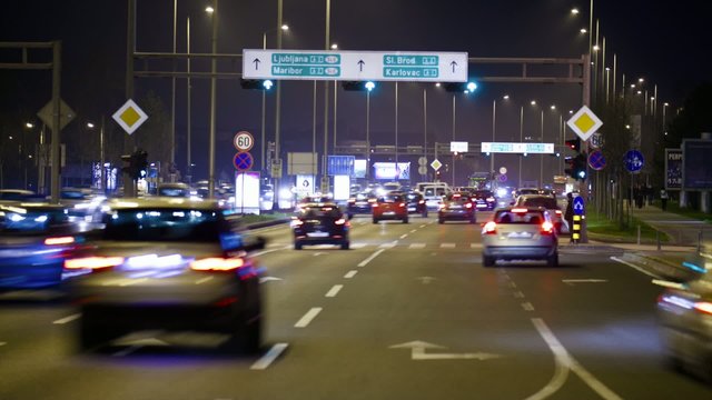 Car driving Rush-hour Traffic in city time lapse night