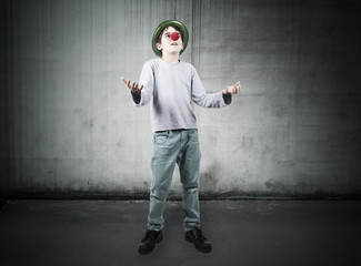 boy with hat and clown nose with expressions