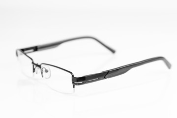 Black frame glasses on white background isolated