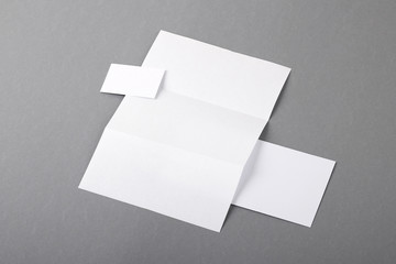 Blank basic stationery. Letterhead folded, business card, envelo