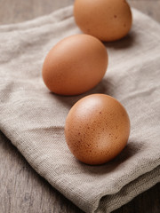 speckled chicken eggs or old table
