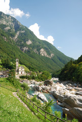 Valley of the mountain river Verzaska in summer Swiss Alps.