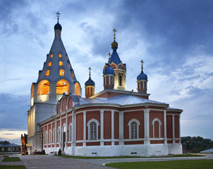 Fototapeta na wymiar Cathedral bell tower and church of Icon of Mother of God of Tikhvin in Kolomna Kremlin. Russia