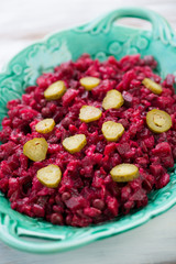 Traditional russian Vinaigrette salad, close-up, vertical shot