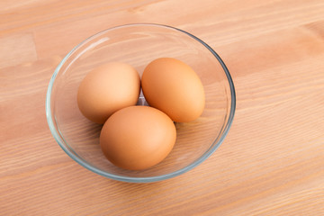 Brown egg in bowl