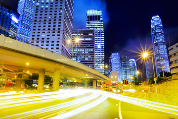 Fototapeta na wymiar Busy traffic in city at night