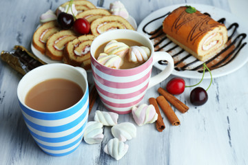 Cup of cappuccino and sweets close up