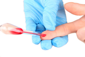 Nurse taking a blood sample, close up
