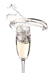 Glass of champagne with splash, isolated on white