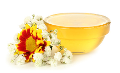 Obraz na płótnie Canvas Sweet honey in glass bowl isolated on white