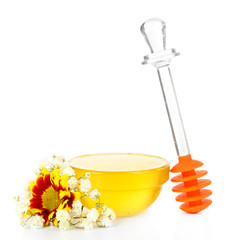 Sweet honey in glass bowl isolated on white
