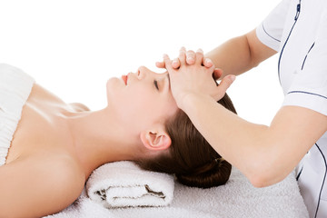 Obraz na płótnie Canvas Relaxed woman enjoy receiving face massage