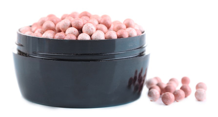 Powder balls isolated on white