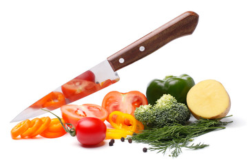 Fresh vegetables with knife