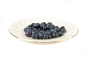 plate with currant isolated over white background