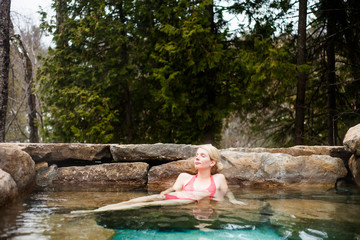 Young Woman Relaxing in a Nordic Spa