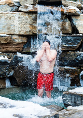 Man under Nordic Cold Water Spa Cascade