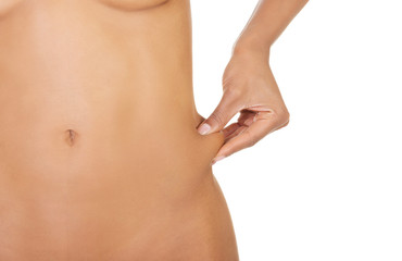 Naklejka premium Naked woman holding fat.