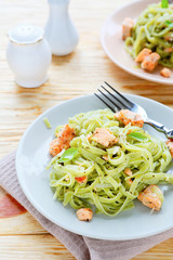nourishing spaghetti with salmon slices