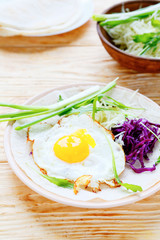 breakfast - fried egg and salad