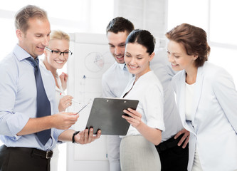business team discussing something in office