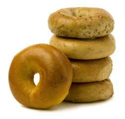 Stack of Four Bagels with OneLeaning on the Side