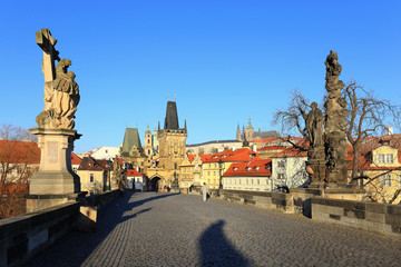 Naklejka premium Prague gothic Castle from Charles Bridge with its Statues